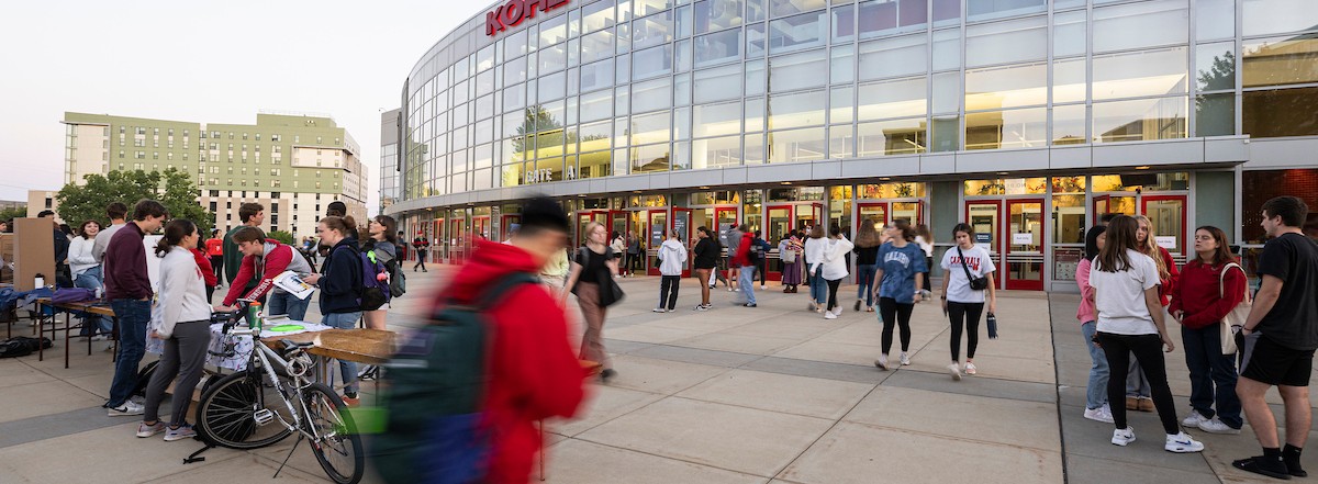 Students make their way through a selection of outdoor information tables as they take part in the annual Fall Student Organization Fair at the Kohl Center at the University of Wisconsin–Madison.
